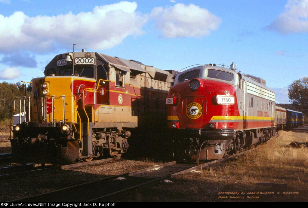 Algoma Central Railway, ACR FP9 1750 swaps power after issues with the F, with ex-ACR WC GP38-2 2002 on northbound number 1 train, at Hawk Junction, Ontario. September 23, 1995. 